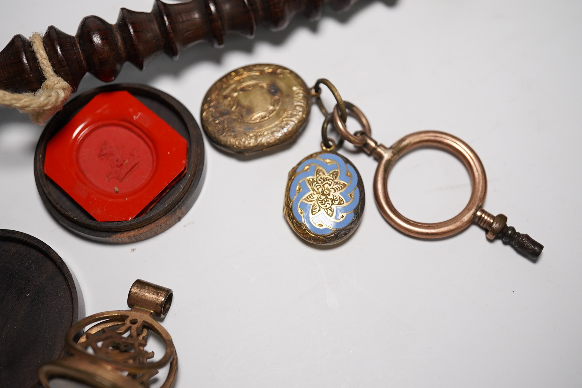 A group of various oddities to include a miser's purse, a lignum vitae ball and cup game, a mourning brooch, spectacles etc. Condition - varies